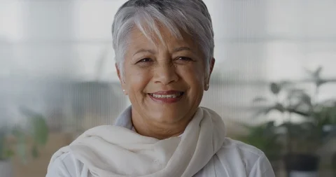 Portrait successful senior indian business woman smiling enjoying professional Stock Footage