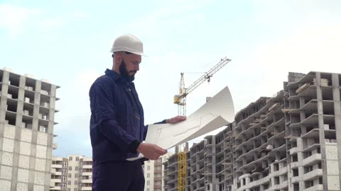 Portrait of a successful young engineer, architect, builder, businessman Stock Footage 133738381