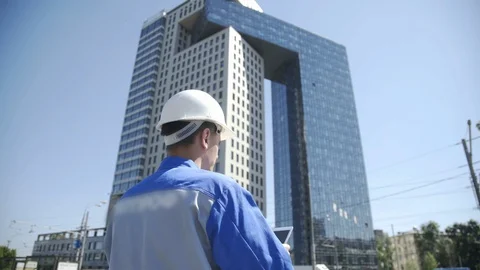 Portrait of a successful young handsome engineer, architect, builder Stock Footage 126370107