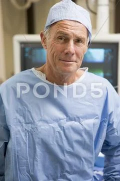 Portrait Of Surgeon In Surgical Scrubs Stock Photos