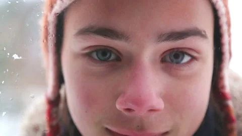 Portrait of a surprised boy in the window outside. Stock Footage 101509372