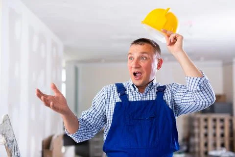 Portrait of surprised man builder Stock Photos