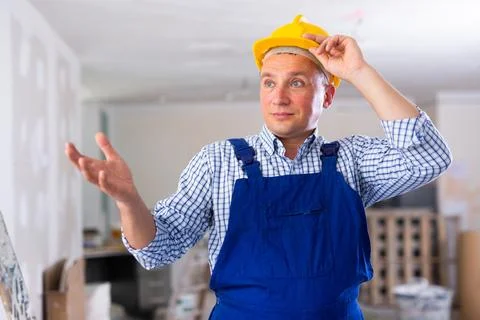 Portrait of surprised man builder Stock Photos