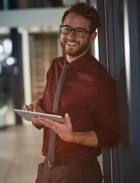 Portrait, tablet and web development with business man in office for online.. Fotos de archivo