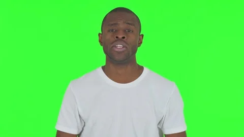 Portrait of Talking African Man Doing Video Chat on Green Background Stock Footage 295162563