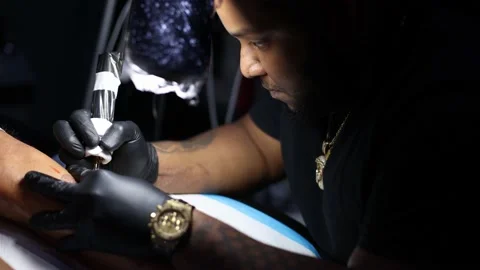 Portrait of tattoo master busy with work at tattoo studio. Close up. Stock Footage 166323327