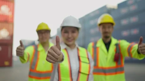 Portrait team of industrial engineer workers giving thumbs up smiling to camera. Stock Footage 262301690