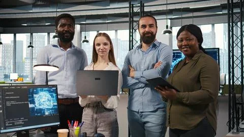 Portrait of teamworking engineers writing code, developing machine learning APIs Foto stock