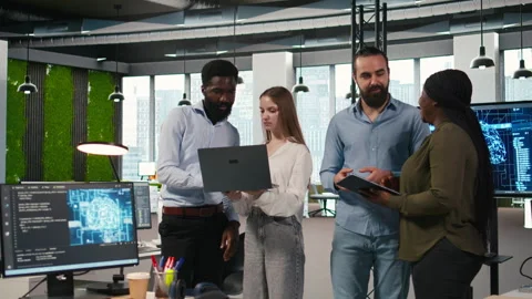 Portrait of teamworking programmers in office developing apps using AI Stock Footage 313015323