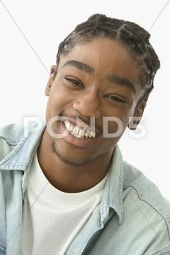 Portrait of teenage boy laughing Stock Photos