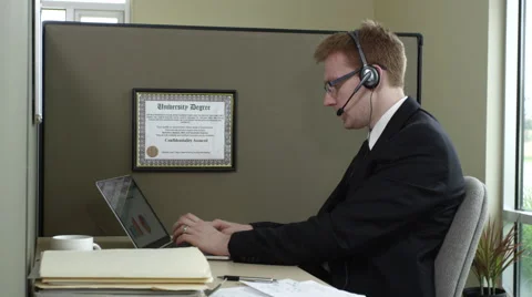 Portrait of Telemarketer using laptop Stock-Footage 67364465