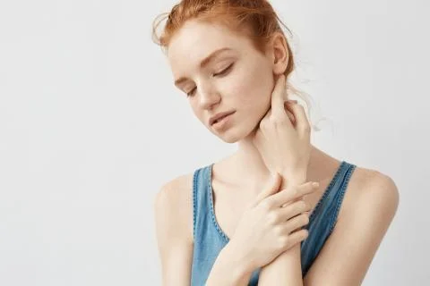 Portrait of tender redhead model posing with closed eyes Stock-Fotos