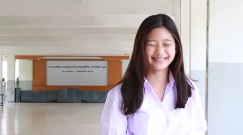 Portrait of thai student High School beautiful girl relax and smile Stock Footage 63152376