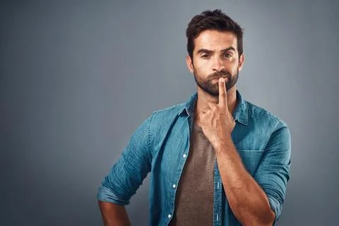 Portrait, thinking and man with doubt, decision and problem solving on grey Stock Photos