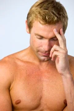 Portrait of thinking bare-chested man Stock Photos