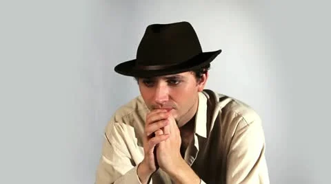 Portrait of thoughtful men in a Hat Stock Footage 11013746