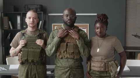 Portrait of Three Diverse Cadets Posing in Tactical Gear Vídeos de archivo 257795340