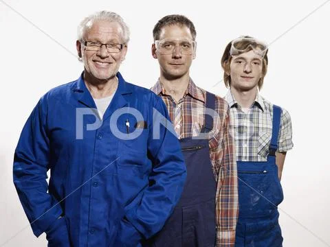 Portrait of three manual workers Stock Photos