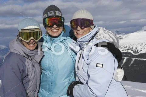 Portrait Of Three Women On Ski Hill, Whistler, Bc, Canada