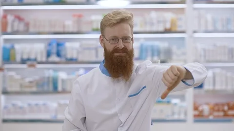 Portrait of Thumbs Down by Pharmacist Stock Footage 125246598