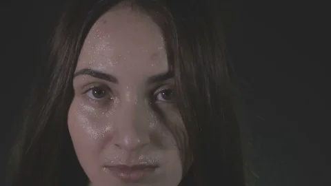 Portrait of tired brunette having rest in short break after workout, slow motion Stock Footage 73107587