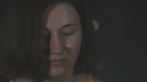 Portrait of tired brunette having rest in short break after workout, slow motion Stock Footage 73107632