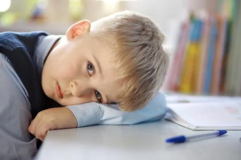 Portrait of a tired student elementary school  Stock Photos