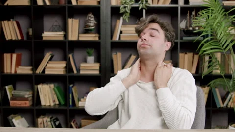 Portrait of a tired young man taking a break from studying, resting his eyes Stock Footage 317705000