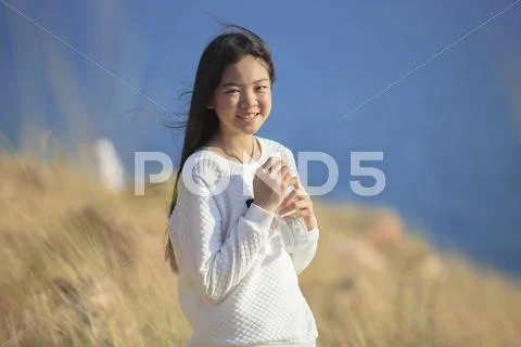 Portrait toothy smiling face of asian girl relaxing emotion outdoor lifestyle Stock Photos