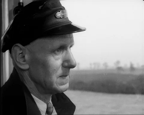 Portrait of train driver, shots from inside of train, UK 1957 Video stock 132323702