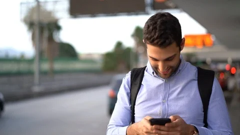 Portrait of Traveler Guy Using Mobile Stock Footage 89242714