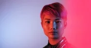 Portrait Of Trendy Asian Gender Fluid Person Looking To Camera With Neon Lights Stock Footage