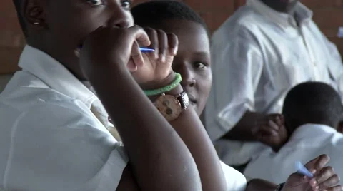Portrait-two African student looking at camera,teacher at background-Edu Africa Stock Footage 58994005