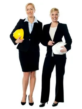 Portrait of two architects with helmets Stock Photos