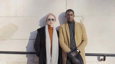 Portrait of two attractive diverse models posing and looking straight to camera 库存影片 122259027