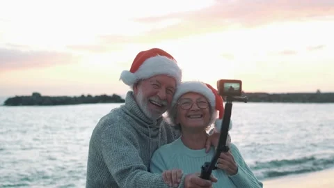 Portrait of two cute old persons having fun and enjoying together at the be.. Stock Footage 224754288