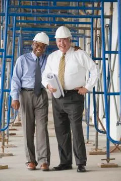 Portrait of two engineers smiling Stock Photos