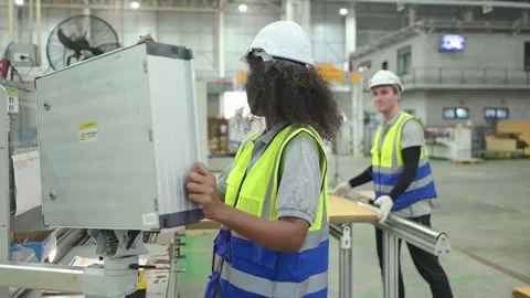 Portrait of two female engineers using laptop Stock Footage 252909045