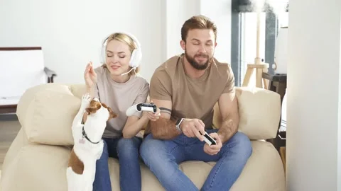 Portrait of two friends playing video games at home. Lifestyle and technology Stock Footage 157645761
