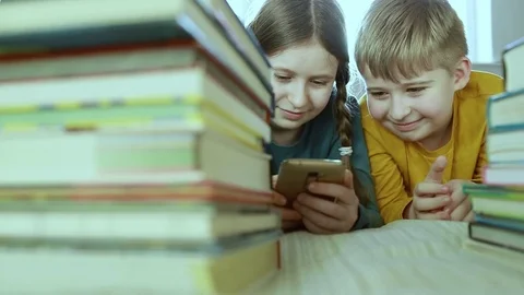 Portrait of two friends using mobile phone  Stock Footage 84314180