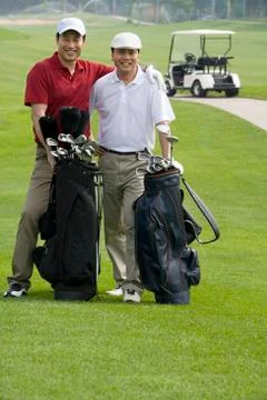 Portrait of Two Golfers on the Course Stock Photos
