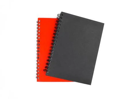 Portrait of two paper note diary of red and black color placed on top of each Stock Photos