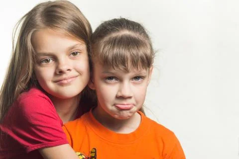 Portrait of two sisters with different characters Stock Photos