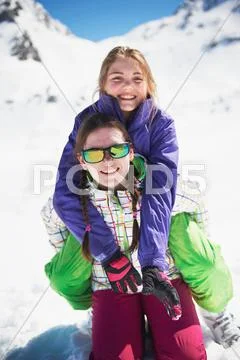 Portrait Of Two Sisters In Ski-Wear