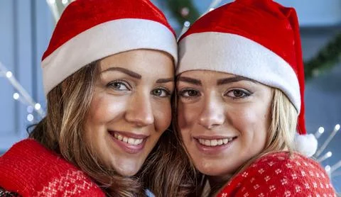 Portrait of two young sisters hugging each other Stock Photos