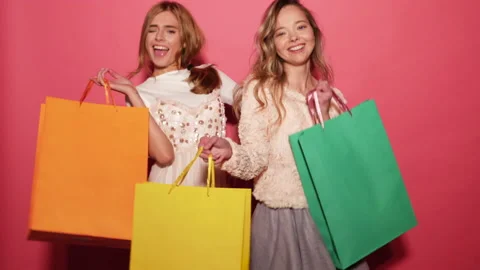 Portrait of two young stylish smiling blond women Видео 140537678