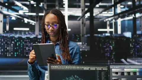 Portrait of upbeat server hub software developer using node tree software Video stock 307021188