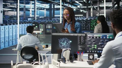 Portrait of upbeat server hub software developer using node tree software 動画素材 309110860