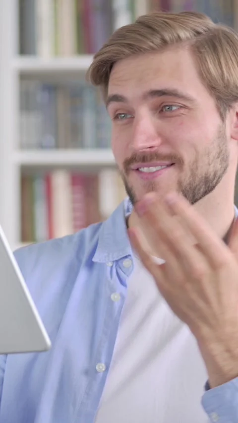 Portrait of Video Call on Tablet by Man in Office, Vertical Video Vídeo Stock 339579999