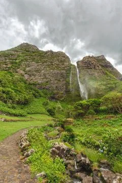 Portrait view of Cascata do Poco do Bacalhau Stock Photos